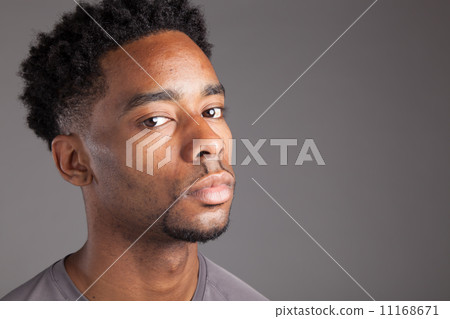 Attractive afro-american man posing in studio Attractive afro-american man posing in studio 11168671
