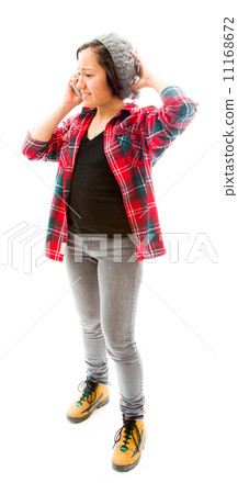 Young woman talking on mobile phone with her hand on her head Young woman talking on mobile phone with her hand on her head 11168672
