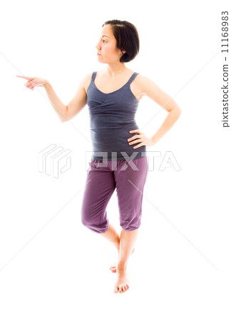 Young woman standing and showing something Young woman standing and showing something 11168983