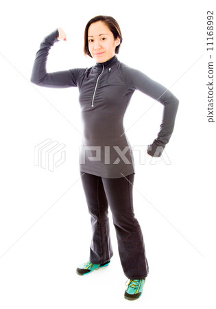 Young woman showing off her muscle 11168992