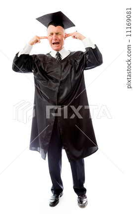 Senior male graduate crying with fingers in ears 11169081