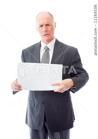 Frustrated businessman holding a blank placard 11169106