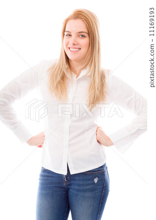 Young woman smiling with her arms akimbo 11169193