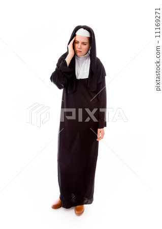 Young nun suffering from headache Young nun suffering from headache 11169271