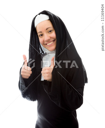 Young nun showing thumbs up sign with both hands 11169404