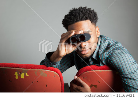 Attractive afro-american man posing in studio Attractive afro-american man posing in studio 11169421