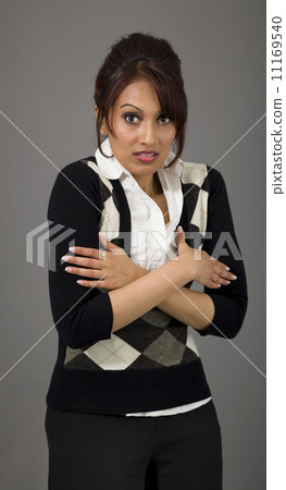 Indian businesswoman shivering Indian businesswoman shivering 11169540