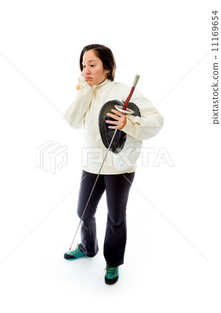 Female fencer looking sad with a holding mask and sword 11169654