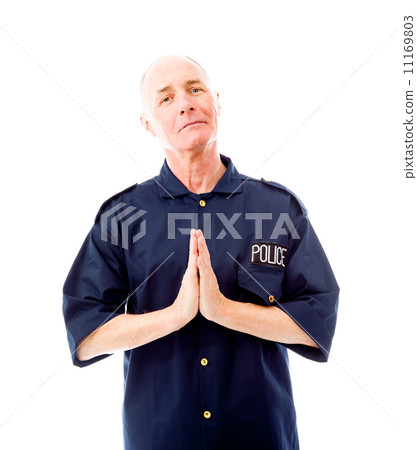Policeman greeting with his hands clasped 11169803