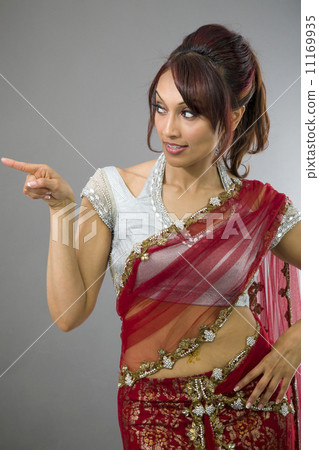 Young Indian woman showing something 11169935
