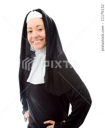Young nun smiling with her arms akimbo 11170132