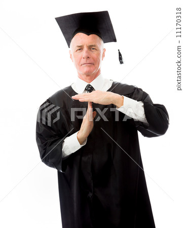 Senior male graduate making timeout gesture Senior male graduate making timeout gesture 11170318