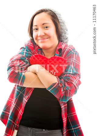 Young woman embracing heart shape Young woman embracing heart shape 11170463