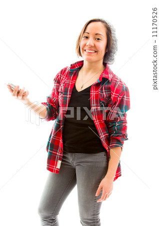 Young woman holding on mobile phone and smiling Young woman holding on mobile phone and smiling 11170526