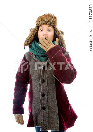 Young woman in warm clothing and looking shocked Young woman in warm clothing and looking shocked 11170856