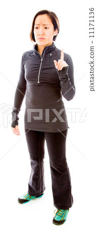 Young woman pointing her finger up and sadness Young woman pointing her finger up and sadness 11171136