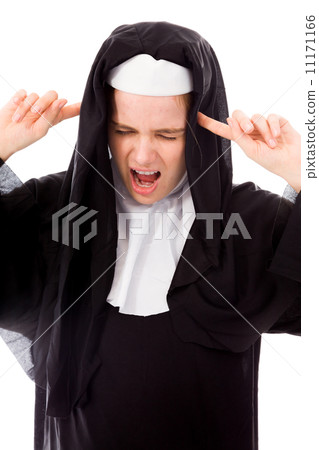 Young nun shouting with fingers in her ears Young nun shouting with fingers in her ears 11171166