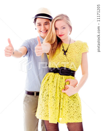 Lesbian couple showing thumbs up sign 11171205