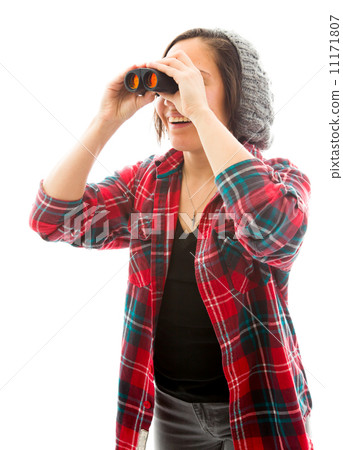 Young woman looking through binoculars 11171807