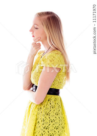 Side profile of a young woman thinking Side profile of a young woman thinking 11171970