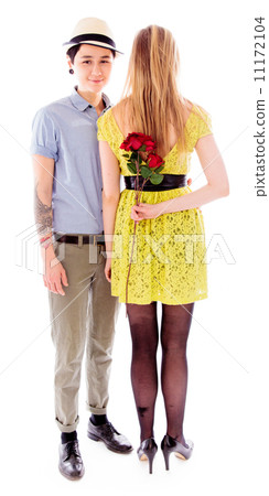 Woman hiding red rose to make surprise to friend 11172104