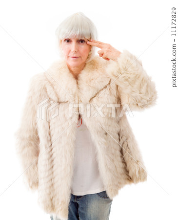 Senior woman holding her finger against her head 11172829