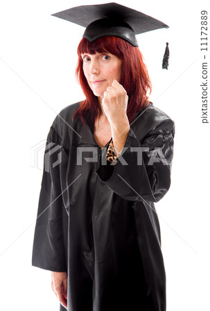 Mature student standing and showing her fist Mature student standing and showing her fist 11172889