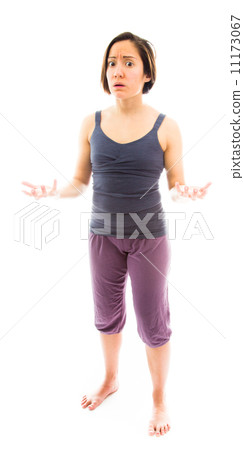 Worried woman spread hands and doesn't know what to do, isolated 11173067
