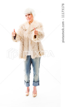 Senior woman showing thumbs up sign from both hands Senior woman showing thumbs up sign from both hands 11173178
