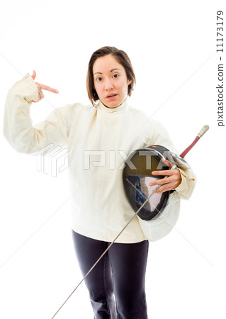 Female fencer pointing with holding a mask and sword Female fencer pointing with holding a mask and sword 11173179
