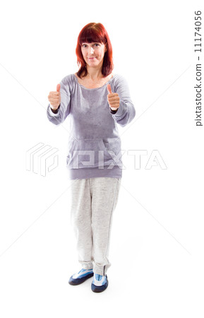 Mature woman showing thumbs up sign with both hands 11174056