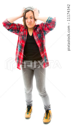 Frustrated woman pulling her hair Frustrated woman pulling her hair 11174342