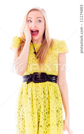 Beautiful young woman looking shocked Beautiful young woman looking shocked 11174865