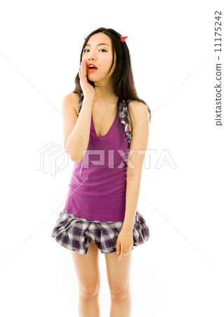 Asian young woman dressed up as a devil and whispering isolated on white background Asian young woman dressed up as a devil and whispering isolated on white background 11175242