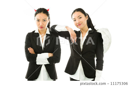 Angel and devil sides of a young Asian businesswoman isolated on white background Angel and devil sides of a young Asian businesswoman isolated on white background 11175306