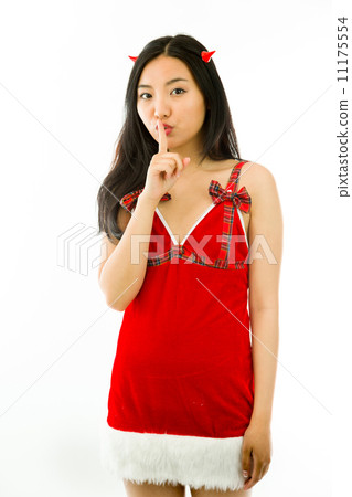 Devil side of a young Asian woman standing with finger on lips asking for silence isolated on white background Devil side of a young Asian woman standing with finger on lips asking for silence isolated on white background 11175554