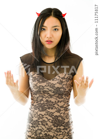 Asian young woman dressed up as a devil and looking frustrate isolated on white background 11175817