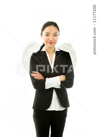Asian young businesswoman dressed up as an angel standing with arms crossed Asian young businesswoman dressed up as an angel standing with arms crossed 11175886