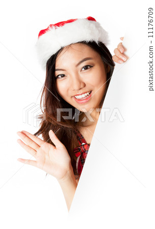 edge of the page Sexy asian santa claus smiling and waving edge of the page Sexy asian santa claus smiling and waving 11176709