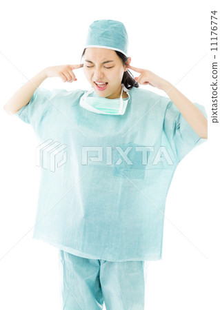 Asian female surgeon shouting with hands in ear Asian female surgeon shouting with hands in ear 11176774