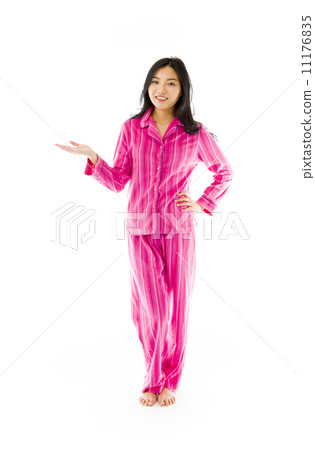 Young Asian woman showing product with open hand palm 11176835