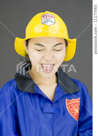 Close up of a lady firefighter shouting Close up of a lady firefighter shouting 11177065