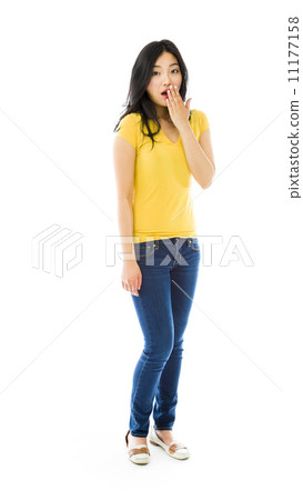 Young Asian woman with shocked expression isolated over white background 11177158