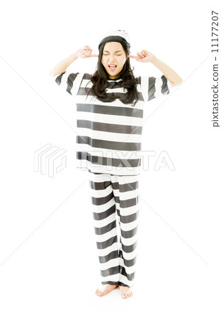 Young Asian woman shouting in frustration in prisoners uniform 11177207