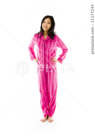 Young Asian woman standing with her arms akimbo 11177245