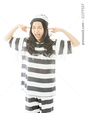 Young Asian woman shouting in frustration in prisoners uniform 11177327
