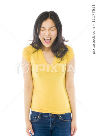 Young Asian woman screaming in frustration Young Asian woman screaming in frustration 11177611
