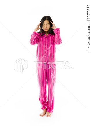 Young Asian woman suffering from headache Young Asian woman suffering from headache 11177723