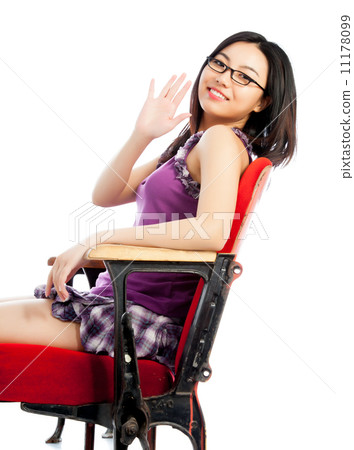 Attractive Asian girl 20s at the theatre isolate white backgroun 11178099