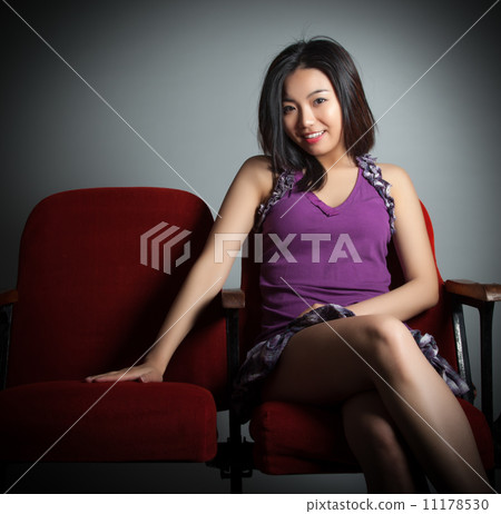 Attractive Asian girl 20s at the theatre isolate white backgroun Attractive Asian girl 20s at the theatre isolate white backgroun 11178530